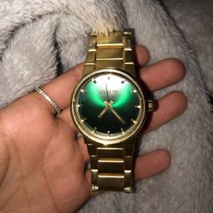 Nixon gold watch